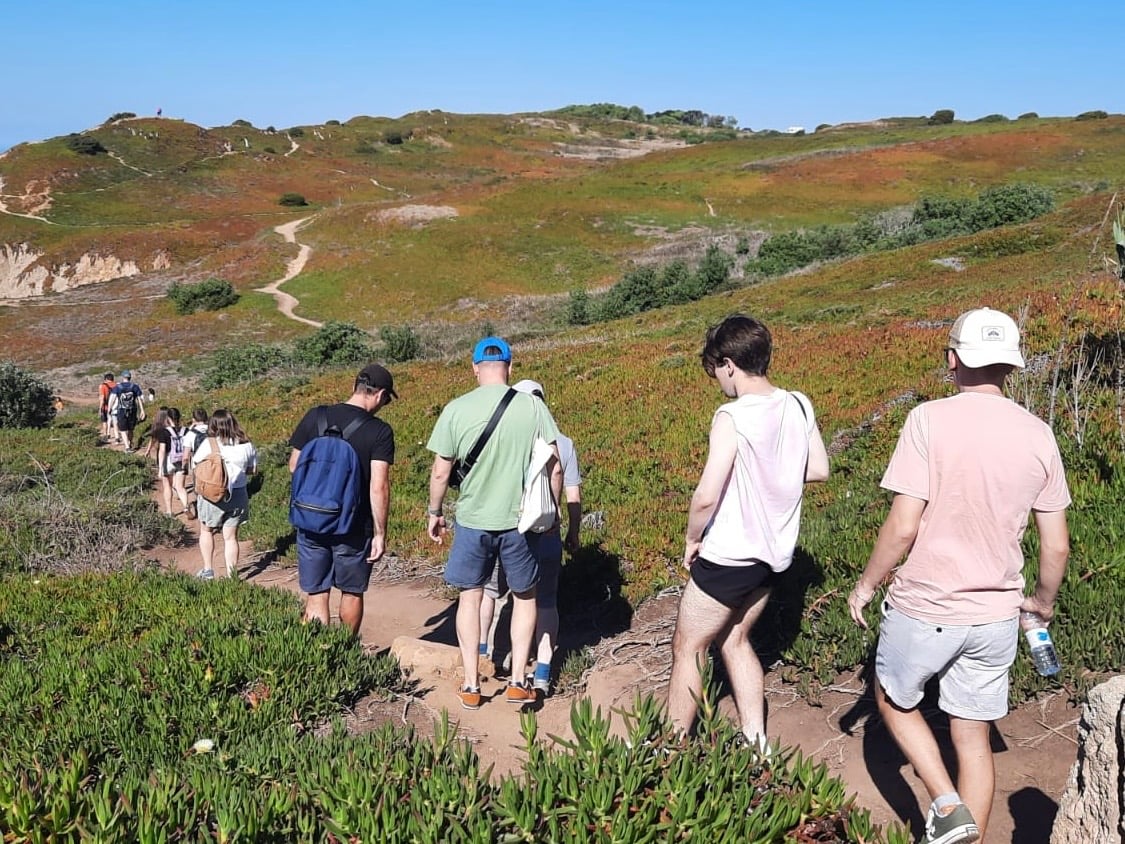 Team hiking in mountains
